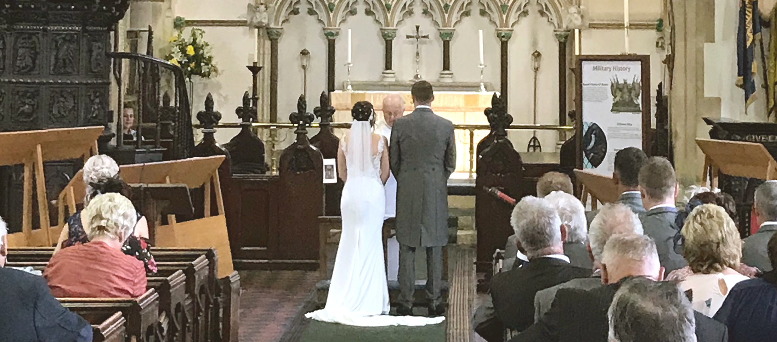 A couple being married (Photo Credit: James Bremridge)